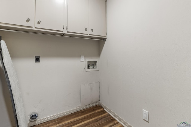 laundry room with hookup for an electric dryer, washer hookup, dark hardwood / wood-style floors, and cabinets