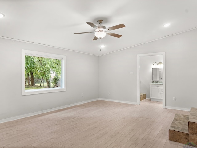 empty room featuring baseboards, recessed lighting, light wood-style floors, and a ceiling fan
