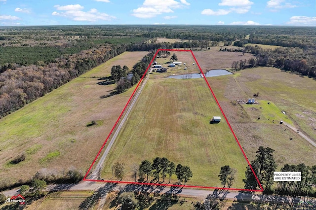 birds eye view of property featuring a rural view