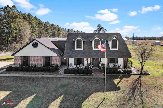 view of front of property featuring covered porch