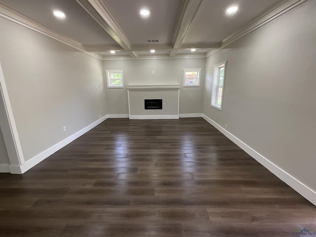 unfurnished living room featuring visible vents, a healthy amount of sunlight, and crown molding