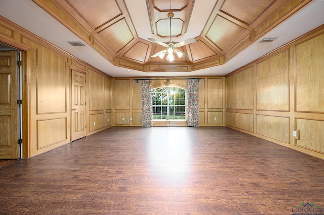 unfurnished room featuring crown molding, a decorative wall, ceiling fan, visible vents, and coffered ceiling