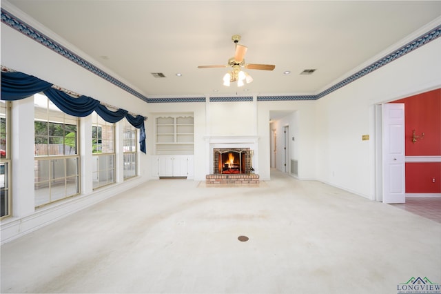 unfurnished living room featuring carpet flooring, visible vents, and a ceiling fan