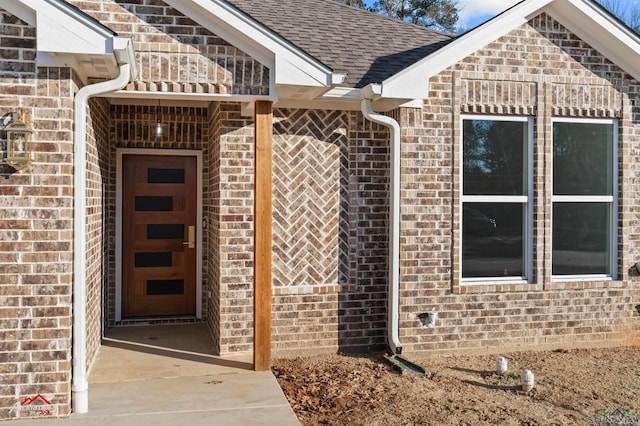 property entrance with a patio