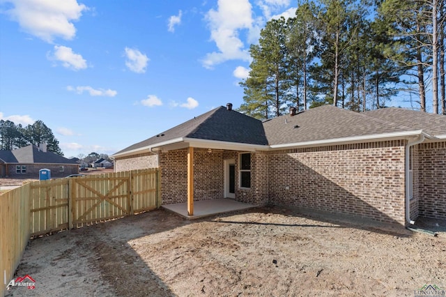 back of house with a patio area