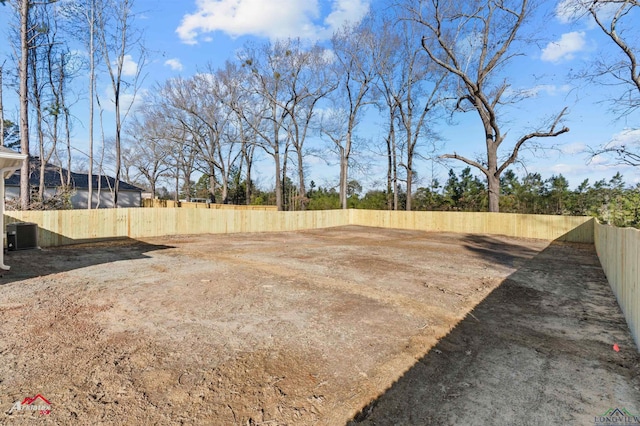 view of yard featuring central AC unit