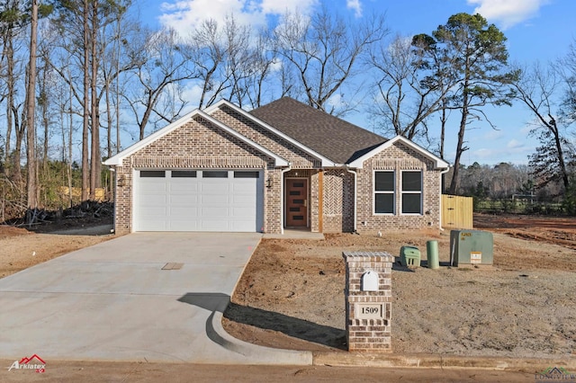 view of front of property featuring a garage