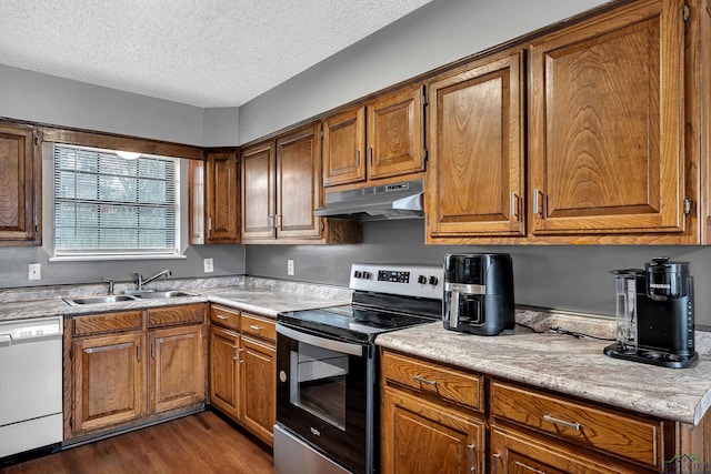 kitchen with white dishwasher, a textured ceiling, sink, dark wood-type flooring, and stainless steel electric stove