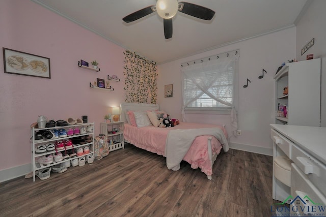 bedroom with baseboards, dark wood-type flooring, ornamental molding, and a ceiling fan