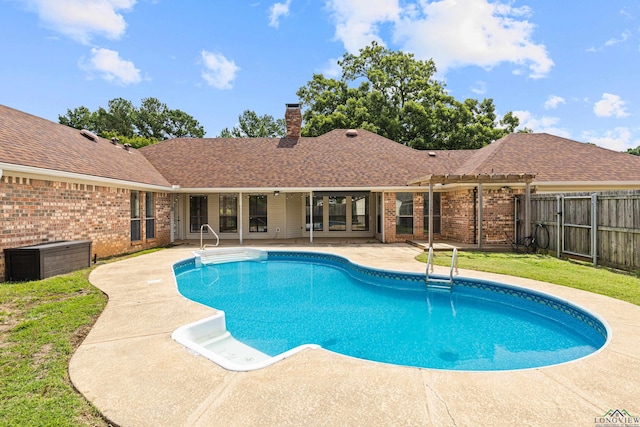 1307 Spring Tree Ln, Kilgore, TX 75662 - view of pool featuring a fenced backyard, a patio area, and a pergola