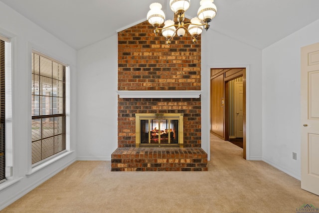 1307 Spring Tree Ln, Kilgore, TX 75662 - unfurnished living room featuring lofted ceiling, a chandelier, carpet flooring, a brick fireplace, and baseboards