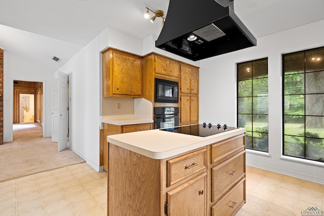 1307 Spring Tree Ln, Kilgore, TX 75662 - kitchen with black appliances, range hood, light countertops, light carpet, and lofted ceiling