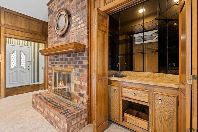 1307 Spring Tree Ln, Kilgore, TX 75662 - bathroom featuring a brick fireplace and vanity