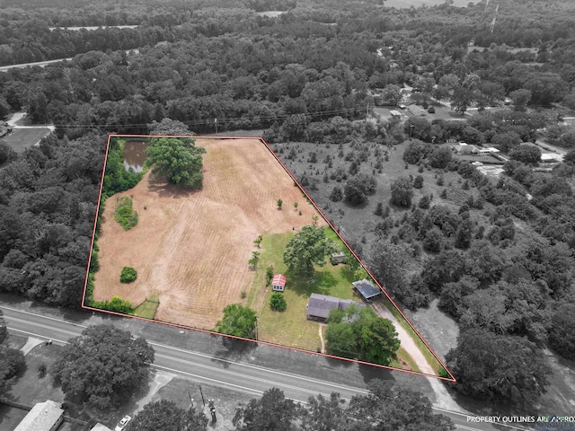 3506 Dudley Rd, Kilgore, TX 75662 - aerial view of property's location featuring a heavily wooded area and property boundaries highlighted