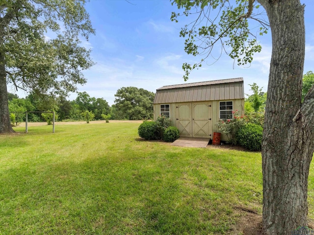 3506 Dudley Rd, Kilgore, TX 75662 - view of grassy yard featuring a shed and an outbuilding