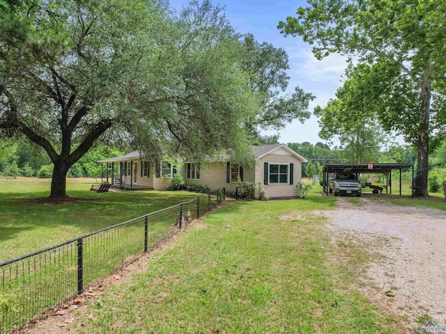3506 Dudley Rd, Kilgore, TX 75662 - view of front of property featuring driveway and a detached carport