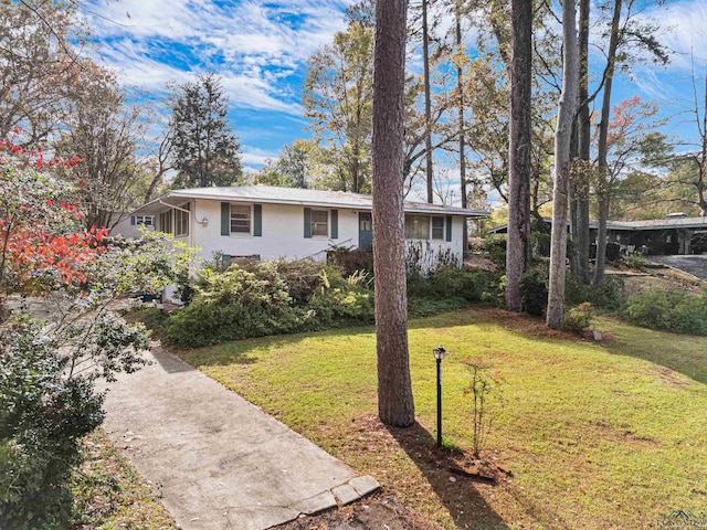 view of front of home with a front yard