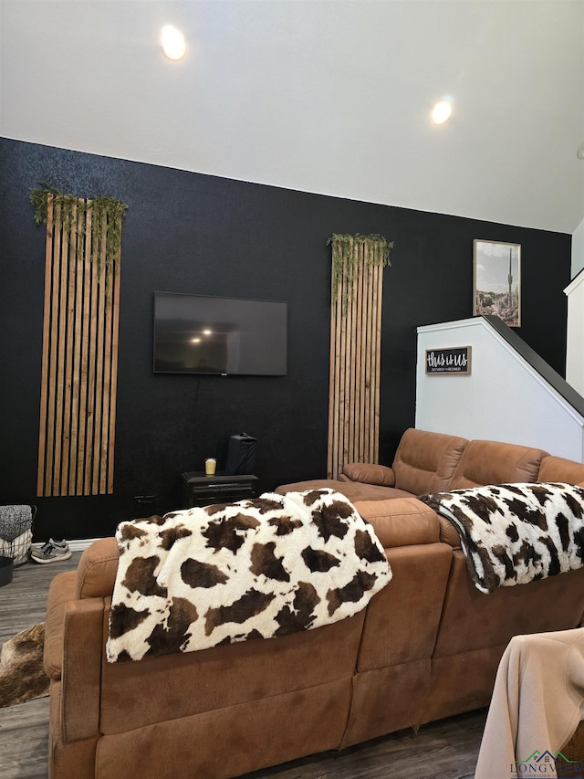 203 W Gay Ave, Gladewater, TX 75647 - living area with wood finished floors, vaulted ceiling, and recessed lighting
