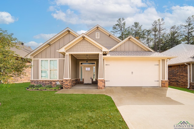 craftsman house with a garage and a front lawn