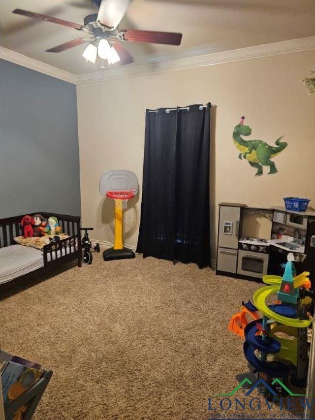 240 Cedar Ridge Rd, Longview, TX 75602 - playroom featuring a ceiling fan, crown molding, and carpet