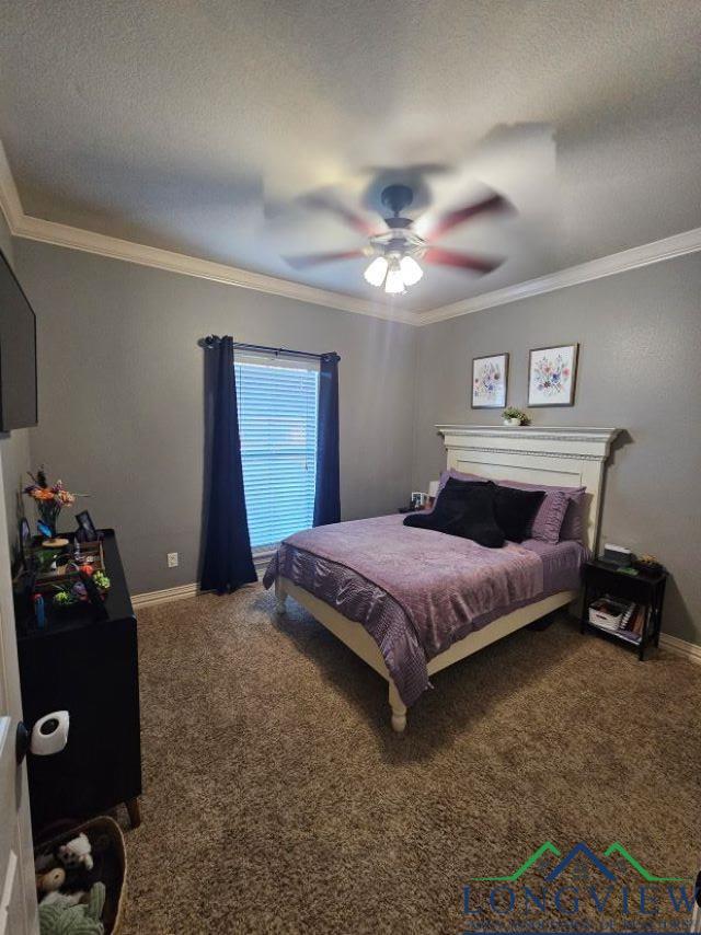 240 Cedar Ridge Rd, Longview, TX 75602 - bedroom featuring carpet floors, crown molding, baseboards, and ceiling fan