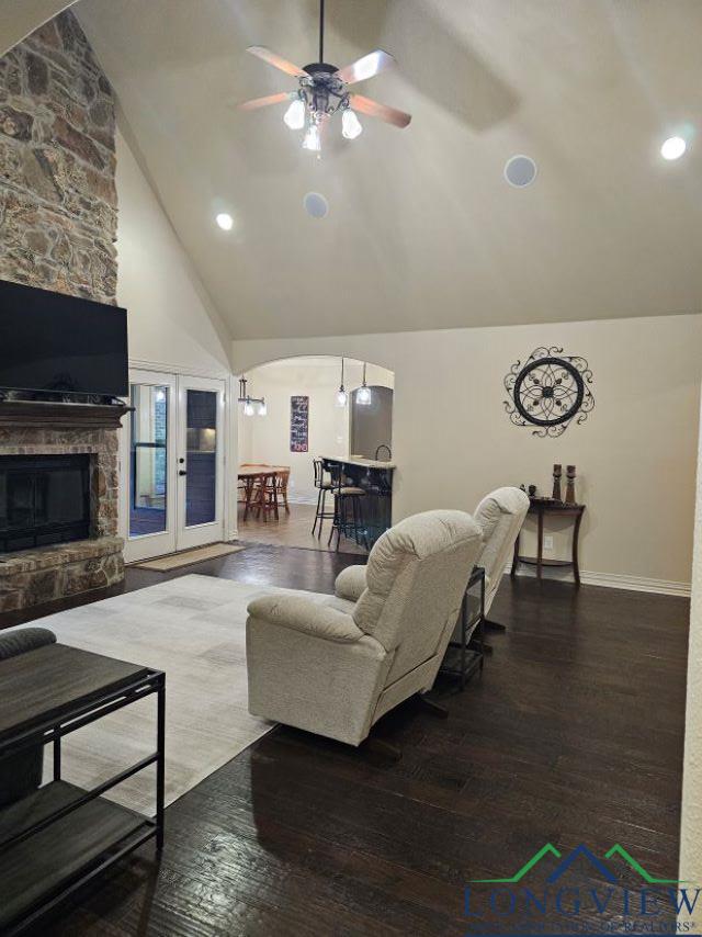 240 Cedar Ridge Rd, Longview, TX 75602 - living area featuring a ceiling fan, arched walkways, wood finished floors, baseboards, and recessed lighting