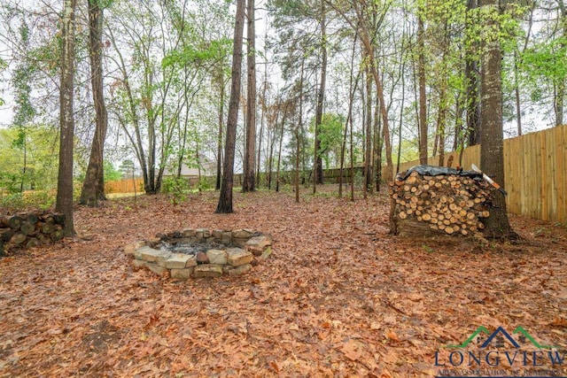 240 Cedar Ridge Rd, Longview, TX 75602 - view of yard with fence and a fire pit