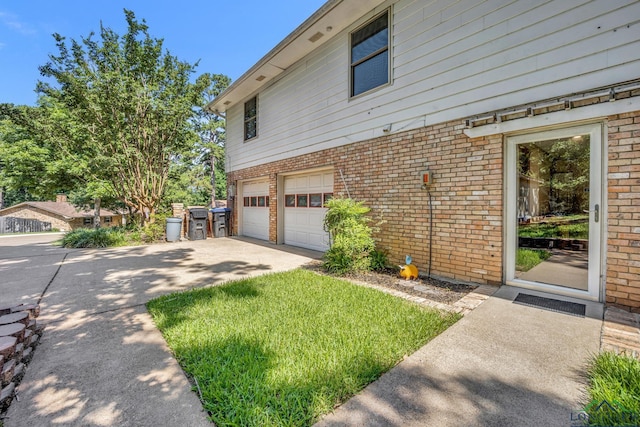 view of property exterior with a garage