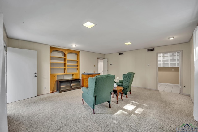 dining space with light colored carpet