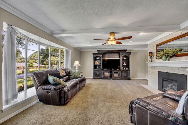 carpeted living room featuring ceiling fan, a fireplace, beamed ceiling, and a textured ceiling