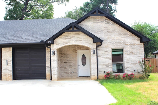 view of front of property featuring a garage