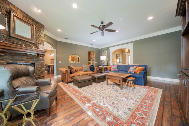728 Sunnybrook Dr, Longview, TX 75605 - living room featuring arched walkways, ceiling fan, dark wood-type flooring, baseboards, and recessed lighting