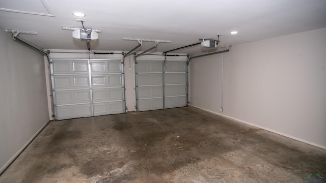 garage featuring a garage door opener