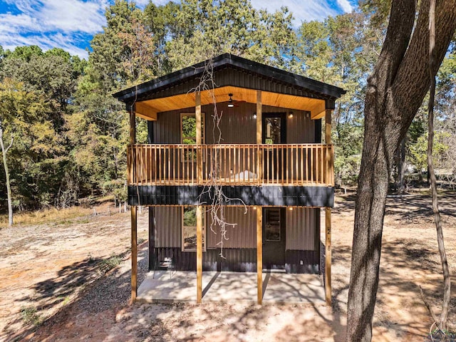 view of front facade featuring a deck and a patio area