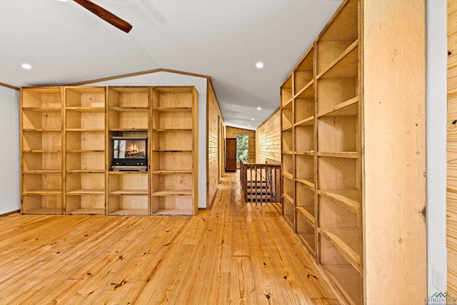 interior space featuring light hardwood / wood-style flooring and vaulted ceiling