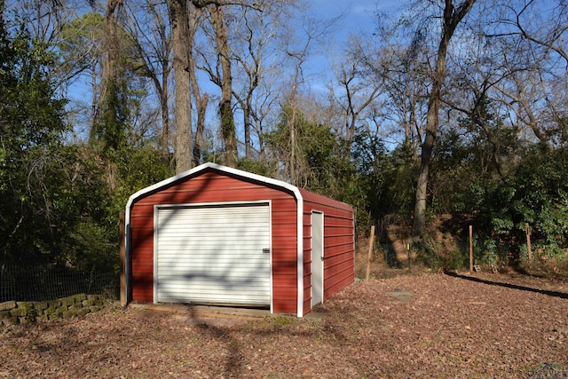 view of outdoor structure with a garage