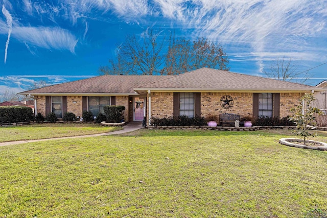 ranch-style house with a front lawn