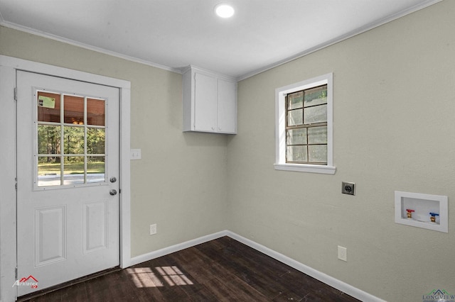 washroom with cabinets, washer hookup, hookup for an electric dryer, dark wood-type flooring, and crown molding