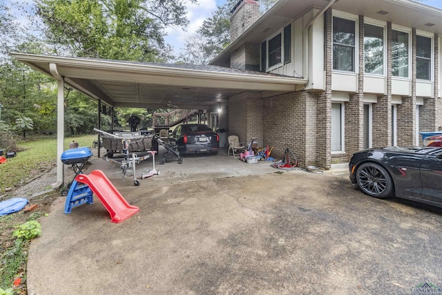 view of car parking with a carport