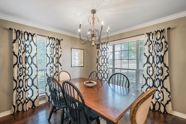 dining area with a notable chandelier, dark hardwood / wood-style flooring, and plenty of natural light