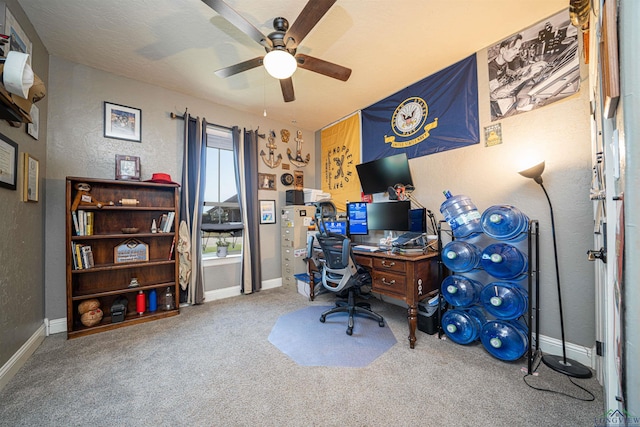 office space with ceiling fan and carpet floors