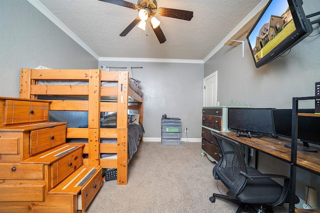 carpeted bedroom with a textured ceiling, ceiling fan, and crown molding