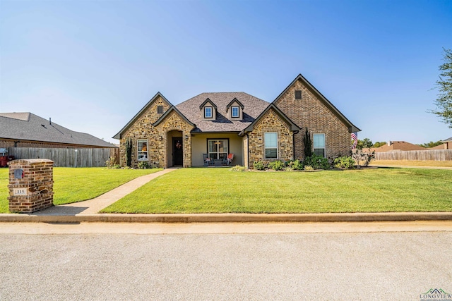 view of front of home featuring a front lawn