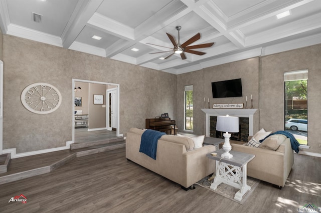 living room with beam ceiling, dark wood-type flooring, and coffered ceiling