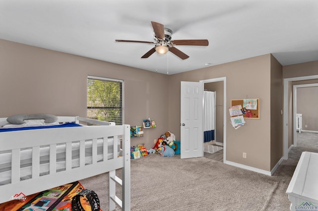 carpeted bedroom featuring ceiling fan