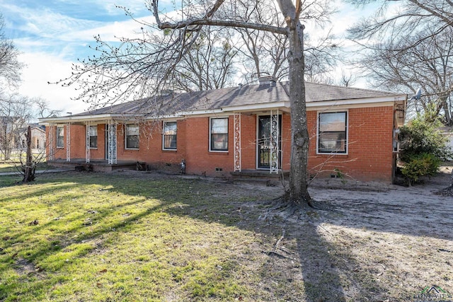 single story home featuring brick siding, crawl space, a chimney, and a front lawn