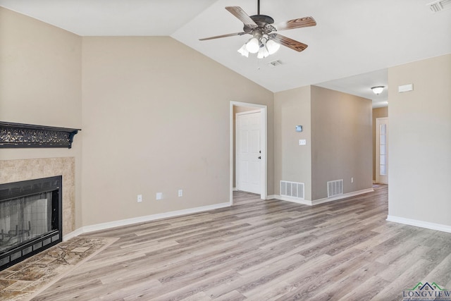 unfurnished living room with wood finished floors, a ceiling fan, and visible vents