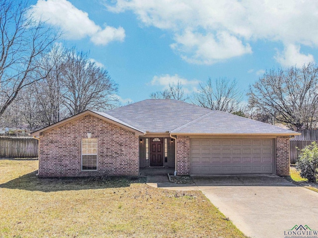 ranch-style home featuring brick siding, fence, a front yard, a garage, and driveway