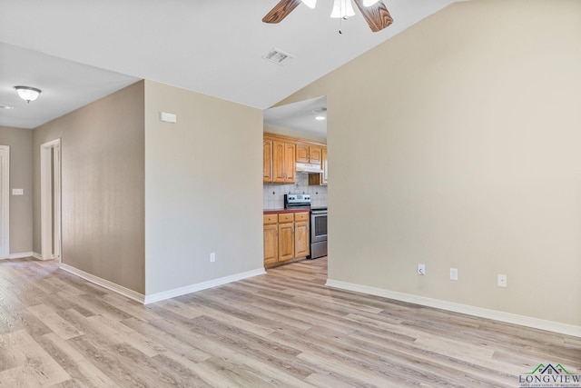 unfurnished living room with lofted ceiling, light wood-style flooring, visible vents, and ceiling fan