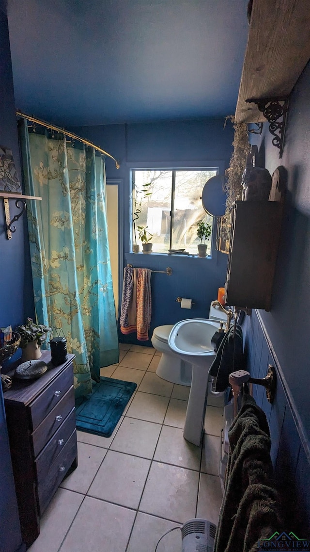 105 Bernard Blvd, Naples, TX 75568 - bathroom featuring tile patterned flooring and a shower with curtain